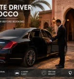 Professional chauffeur opening a luxury black Mercedes in Morocco for private driver and chauffeur service