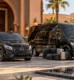 Mercedes V-Class vs Sprinter Morocco with luggage outside a luxury hotel, comparing group and baggage capacity